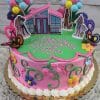 A round SC-030 Barbie cake with pink and green frosting, decorated with butterflies, flowers, balloons, and Barbie & friends toppers. “Happy Birthday Nitya” is written in pink icing.