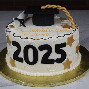 The GC-035 is a round graduation cake with "2025" in black, gold stars, a diploma and graduation cap on top. "Congratulations Lyric!" is written in gold icing. The cake is presented on a gold board.