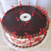 The BD-063 Record/music notes cake is round with chocolate icing, a white base, red musical notes, and a record design on top. "Happy Birthday Nielli" is written in red icing with brown and red decorations.