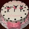 CB-026A: Round white cake with black polka dots, three black ballerina silhouettes in pink tutus, “Happy 3rd Birthday Arianna” in pink, and a large pink bow at the base.