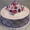 BR-014: A round birthday cake with purple and white icing, pink writing, pink and purple roses, butterfly decorations, and “Happy Birthday, Akiko” written on top.